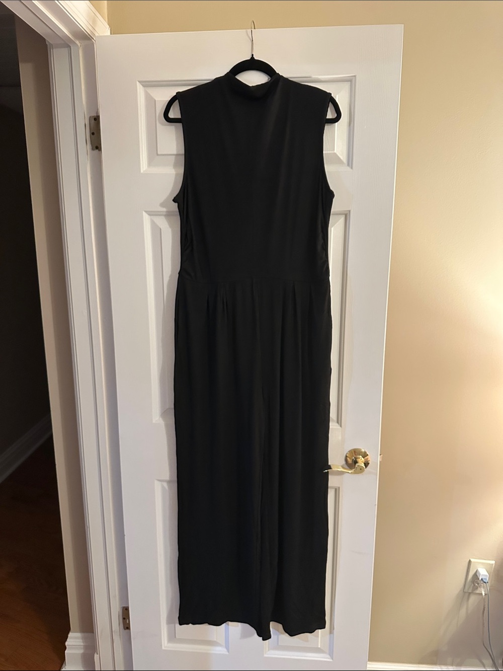 Sleeveless Black Jumpsuit with High Neck